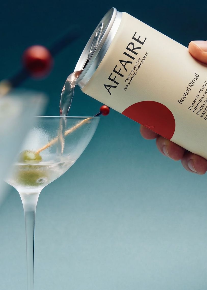 Product photography for Affaire featuring the Rooted Ritual can pouring into a martini glass by TRUFFL branding agency