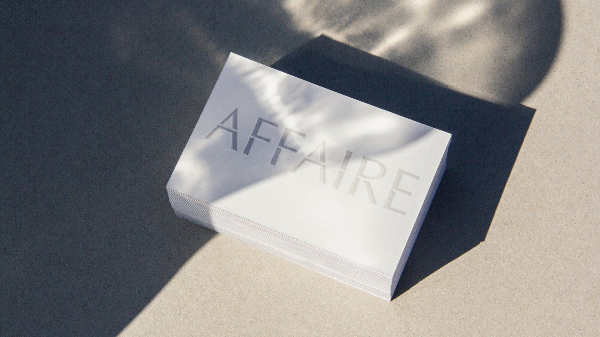 Stationery design for Affaire featuring embossed business cards by TRUFFL branding agency